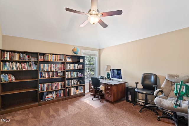 home office featuring carpet floors, lofted ceiling, and ceiling fan