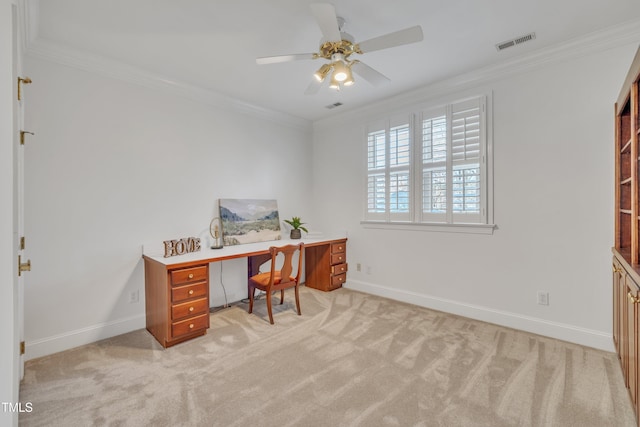 home office featuring light colored carpet, visible vents, crown molding, and baseboards