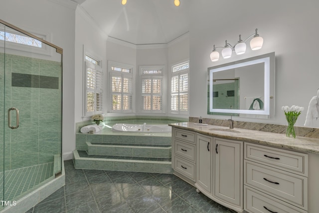 bathroom with vanity, marble finish floor, ornamental molding, a shower stall, and a bath