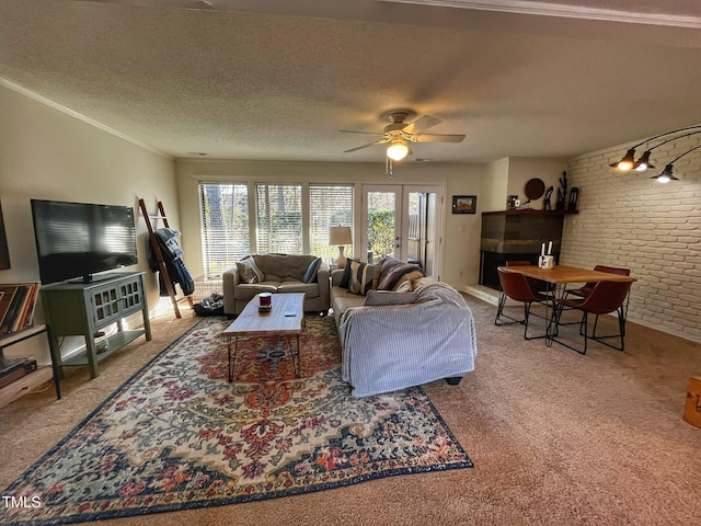 living room with a textured ceiling, ceiling fan, and carpet flooring