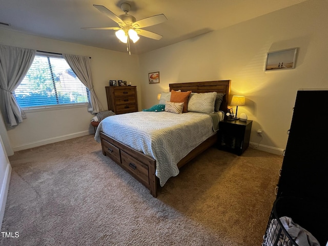 bedroom featuring visible vents, a ceiling fan, baseboards, and carpet floors