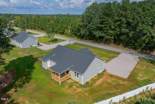 aerial view featuring a view of trees