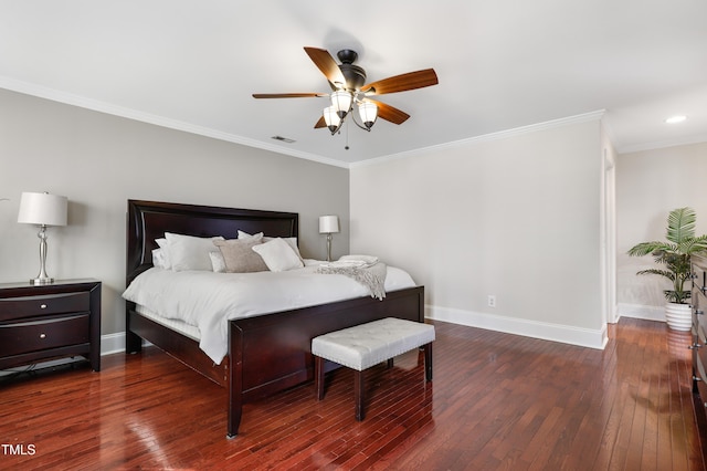 bedroom featuring dark wood-style flooring, visible vents, crown molding, and baseboards