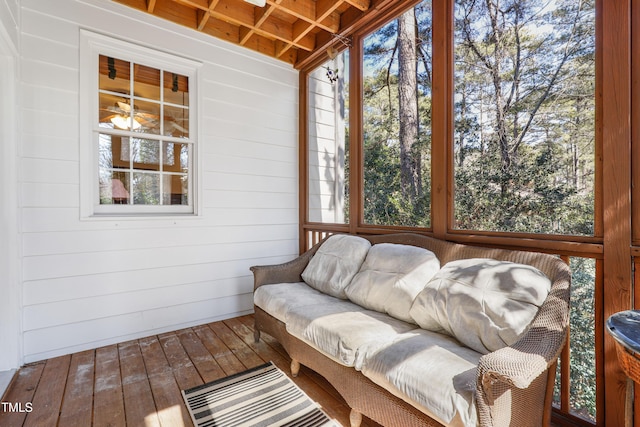 sunroom / solarium featuring a healthy amount of sunlight