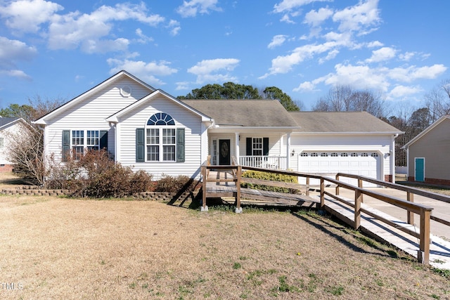 ranch-style house with a front yard, concrete driveway, covered porch, and an attached garage