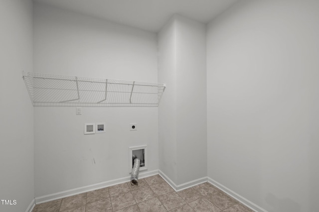 clothes washing area with laundry area, washer hookup, electric dryer hookup, and baseboards