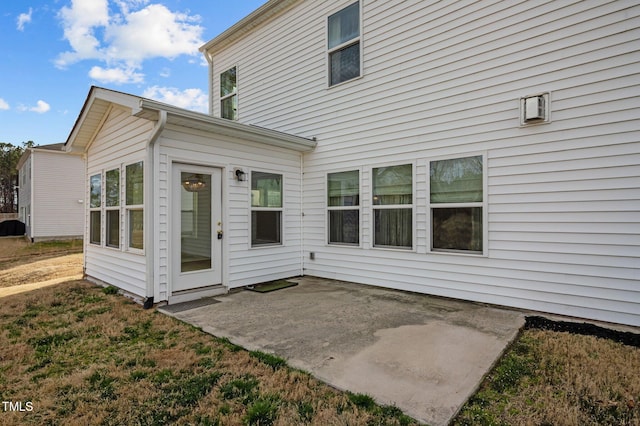 rear view of property with a patio