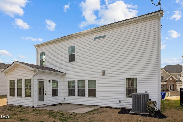 back of house featuring a patio and central AC unit