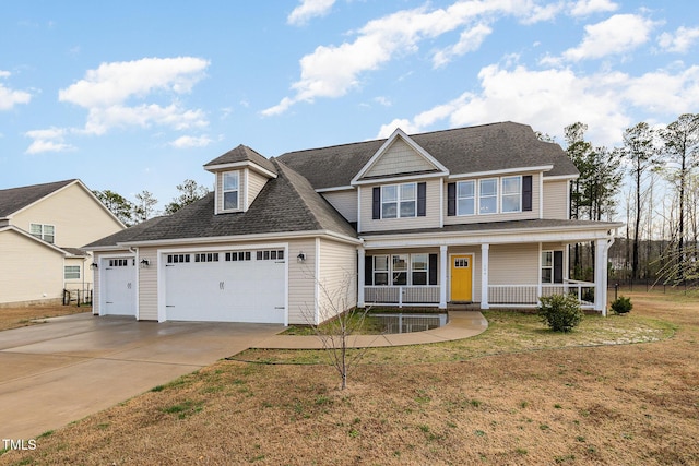 view of front facade featuring concrete driveway, roof with shingles, an attached garage, a porch, and a front yard