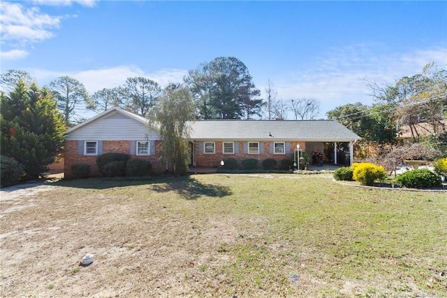 ranch-style home with a front lawn and brick siding