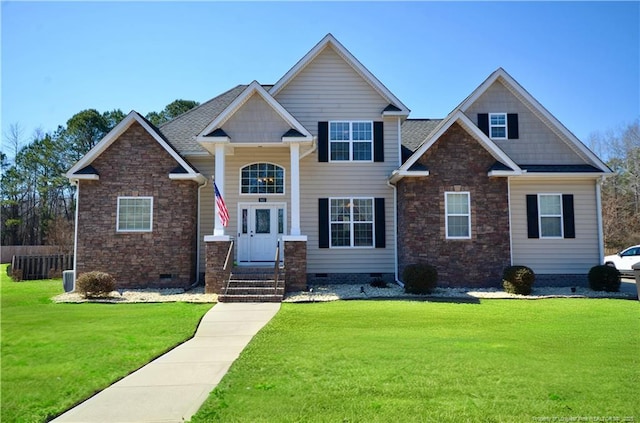 craftsman-style home featuring crawl space and a front lawn