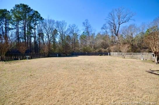 view of yard with fence