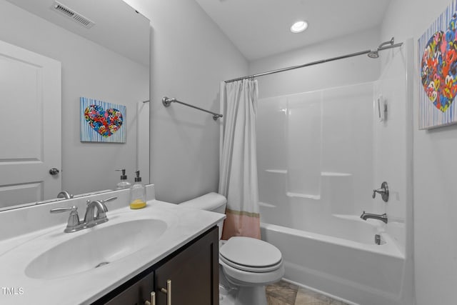 bathroom with shower / bath combo, visible vents, vanity, and toilet