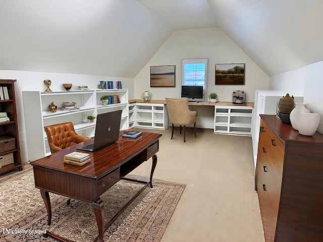 office area with vaulted ceiling