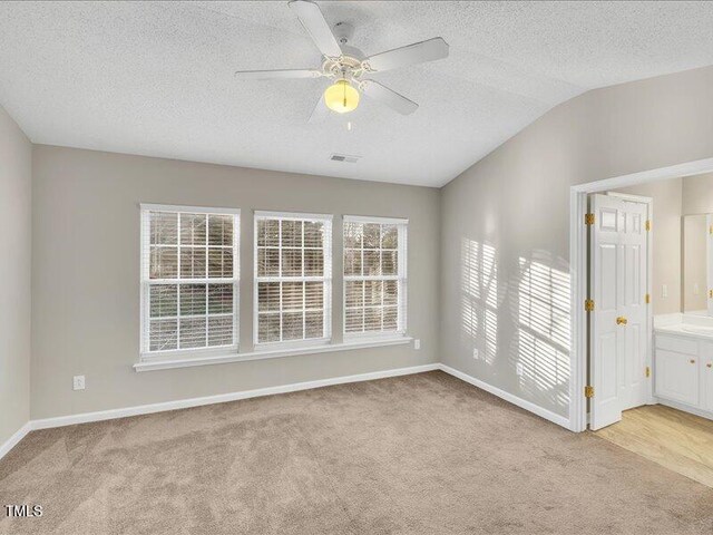 706 Canyon Lake Cir, Morrisville, NC 27560 - interior space featuring visible vents, a textured ceiling, baseboards, and light carpet