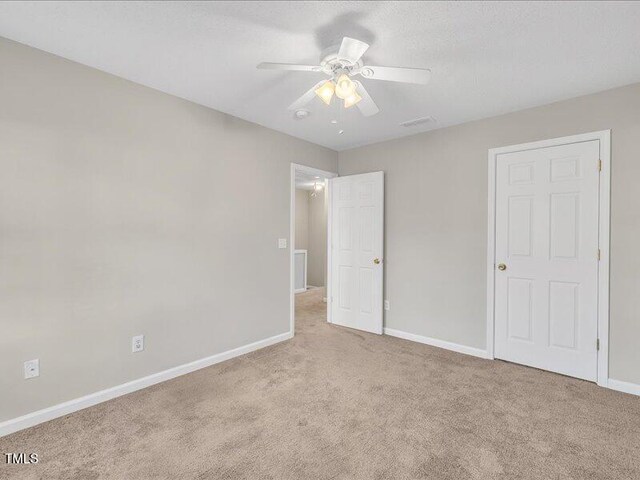 706 Canyon Lake Cir, Morrisville, NC 27560 - unfurnished bedroom featuring baseboards, ceiling fan, carpet, and visible vents