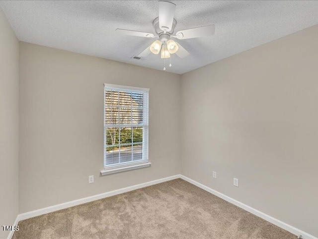 706 Canyon Lake Cir, Morrisville, NC 27560 - spare room featuring visible vents, carpet, and baseboards