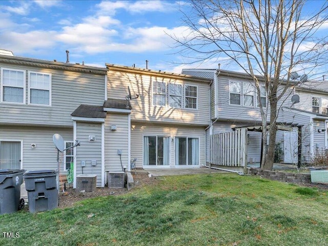 706 Canyon Lake Cir, Morrisville, NC 27560 - back of house with a yard and cooling unit