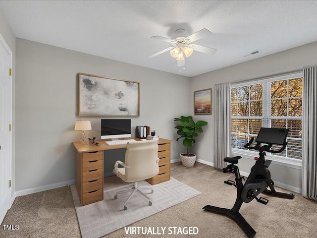 706 Canyon Lake Cir, Morrisville, NC 27560 - office space with visible vents, baseboards, ceiling fan, and light carpet