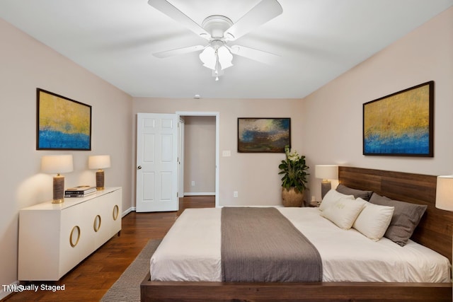 bedroom with dark wood-style floors and ceiling fan