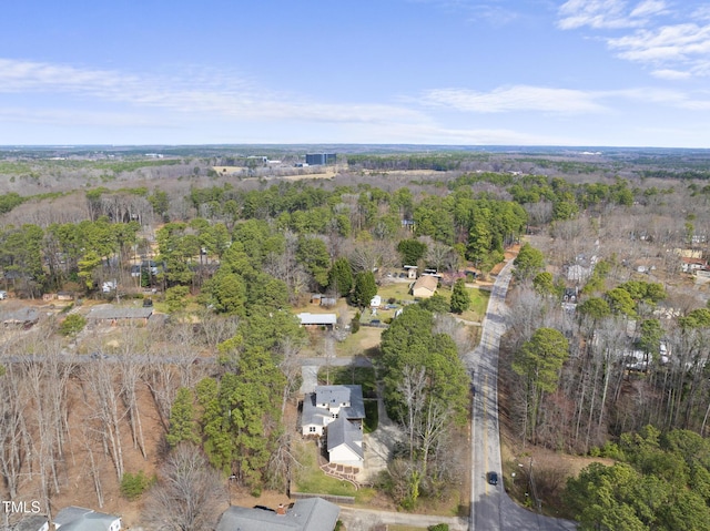 bird's eye view featuring a view of trees