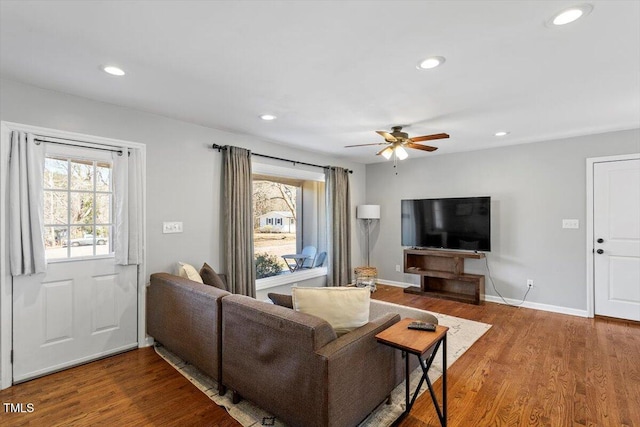 living room with a ceiling fan, baseboards, wood finished floors, and recessed lighting