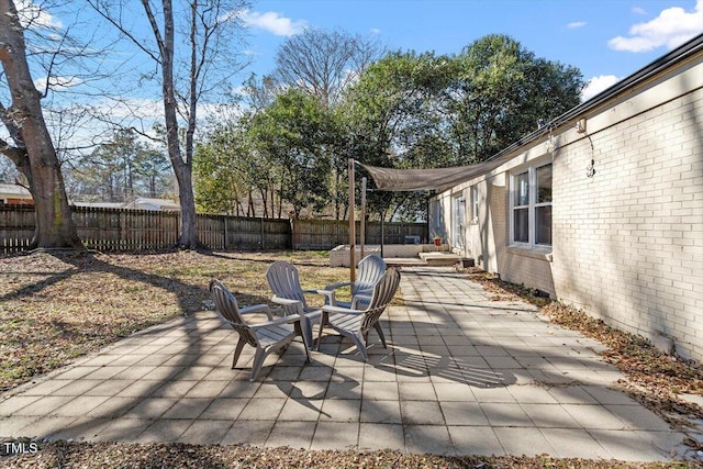 view of patio with a fenced backyard