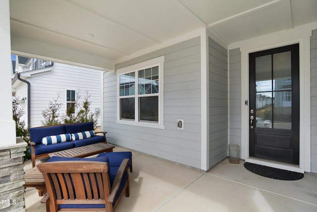 view of patio featuring a porch