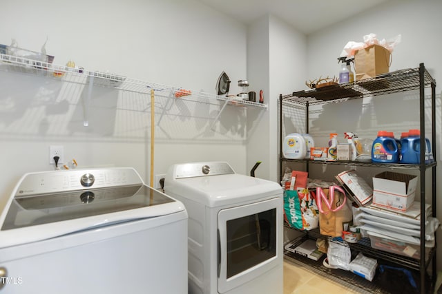 laundry room featuring washer and dryer and laundry area