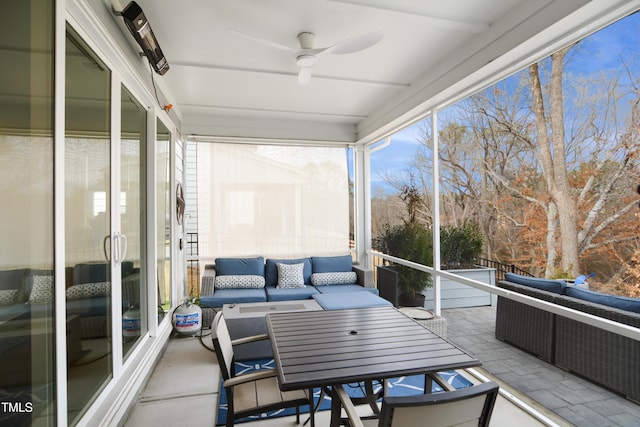 sunroom with ceiling fan and a wealth of natural light