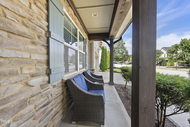 view of patio featuring a porch