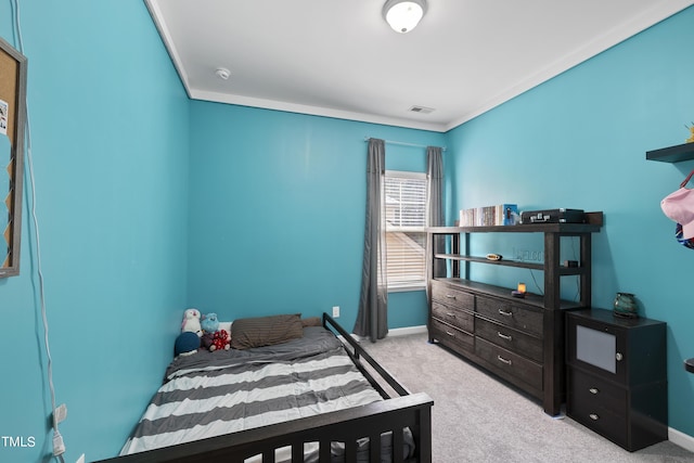 bedroom with carpet floors and baseboards