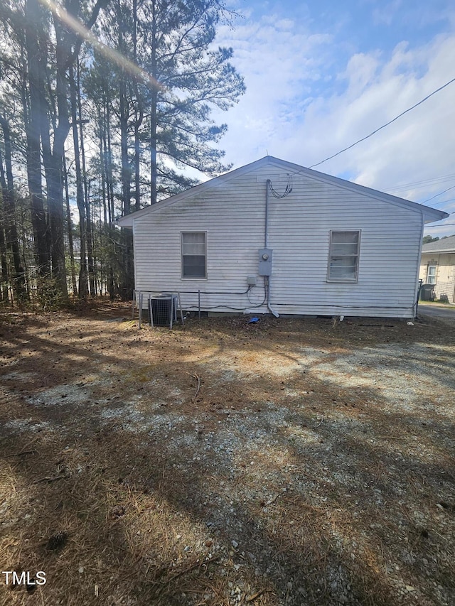 view of home's exterior featuring central air condition unit