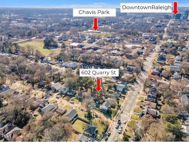 birds eye view of property with a residential view