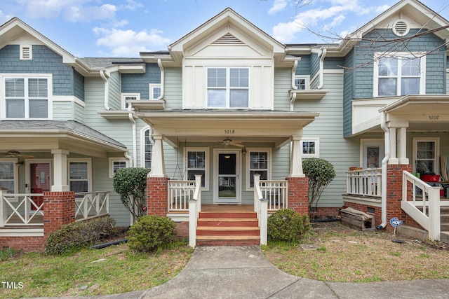 multi unit property featuring a porch