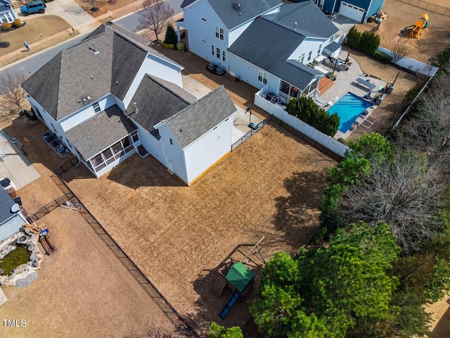 birds eye view of property with a residential view