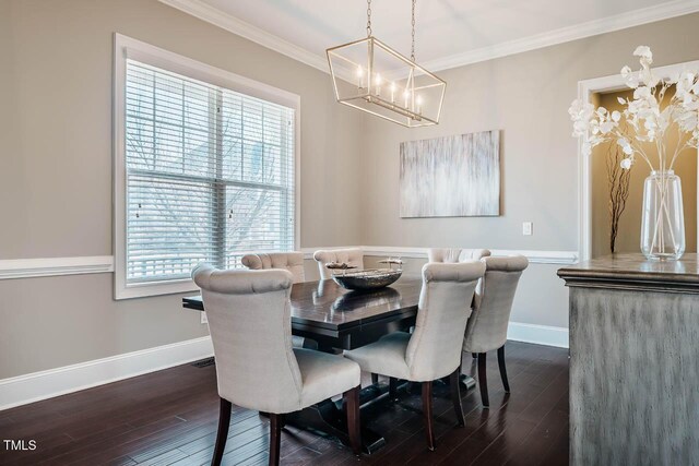 dining room with baseboards, crown molding, and dark wood-type flooring