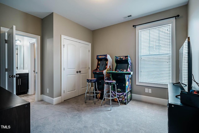 playroom featuring carpet, visible vents, and baseboards