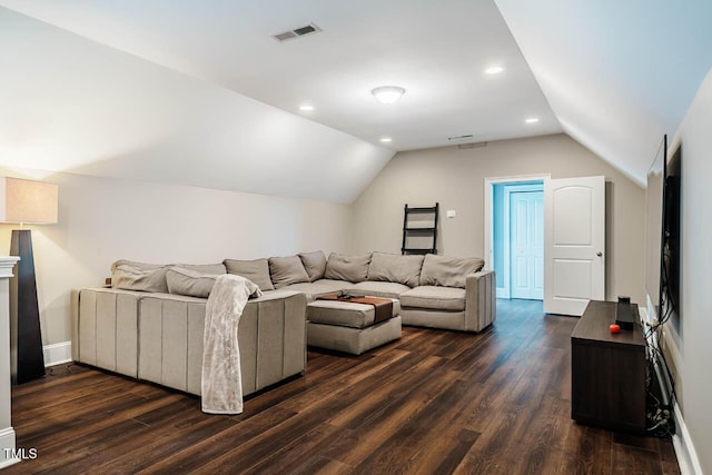 living room with dark wood-type flooring, baseboards, visible vents, and vaulted ceiling