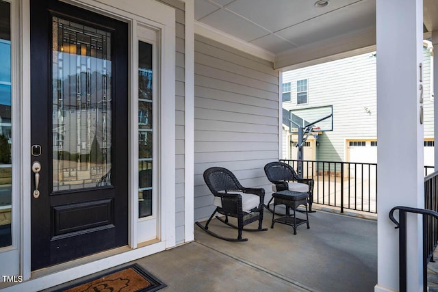 doorway to property with covered porch