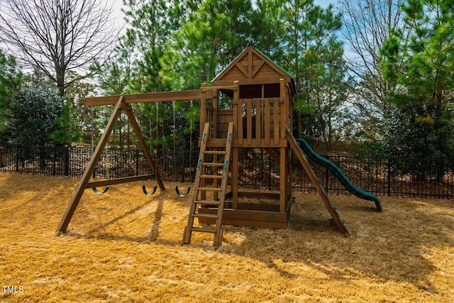 view of playground featuring fence