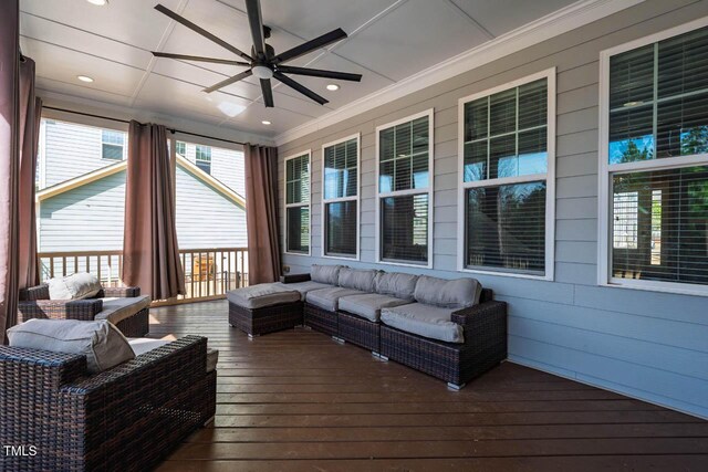 sunroom / solarium with ceiling fan