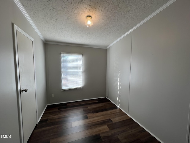 unfurnished room with a textured ceiling, crown molding, and wood finished floors