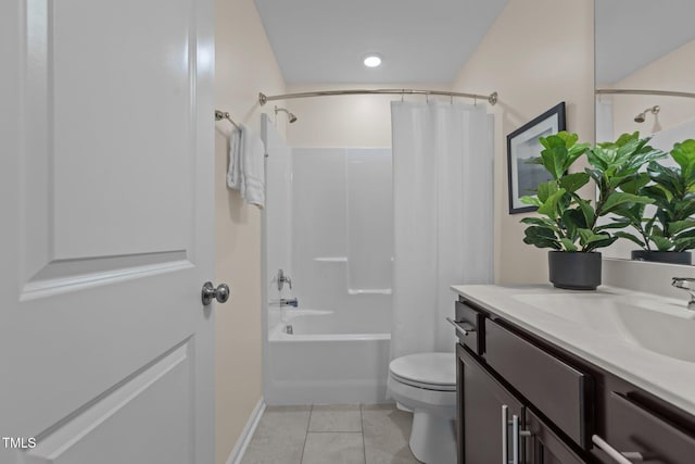 bathroom with shower / bath combo, vanity, toilet, and tile patterned floors