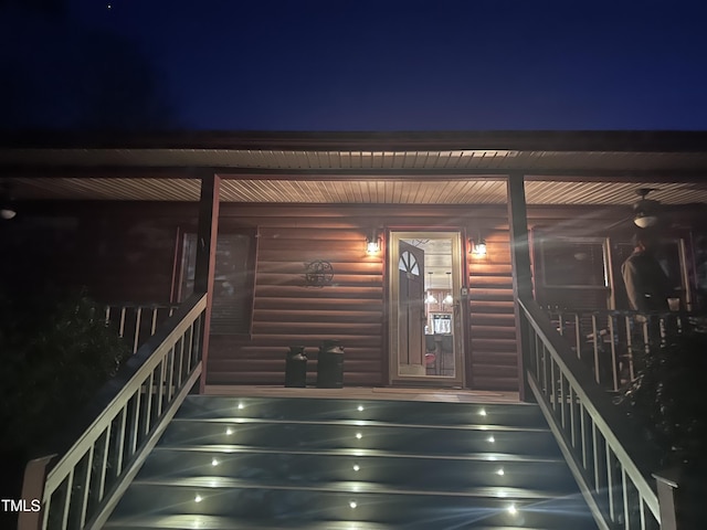 stairs featuring log walls