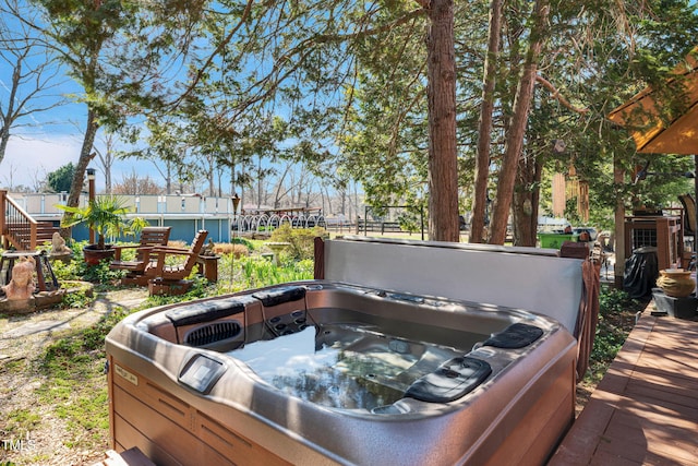 view of patio / terrace featuring a hot tub