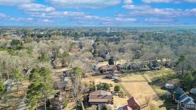 aerial view featuring a forest view