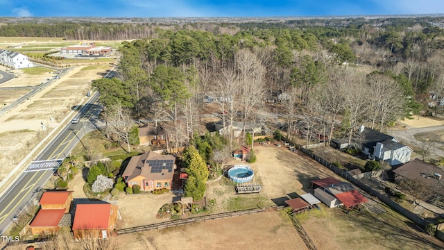 bird's eye view featuring a forest view