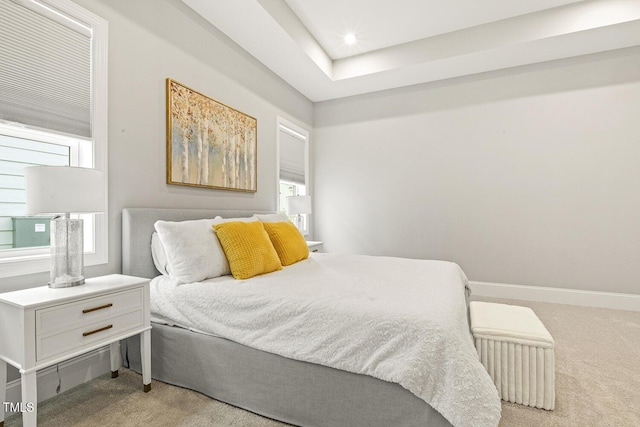 bedroom featuring recessed lighting, baseboards, and light colored carpet