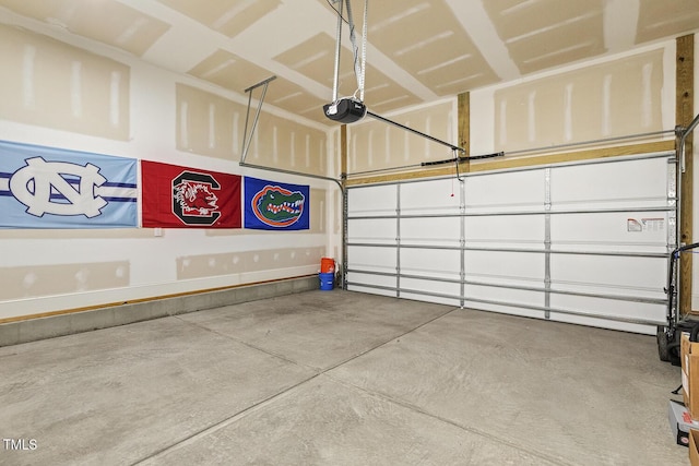 garage featuring a garage door opener